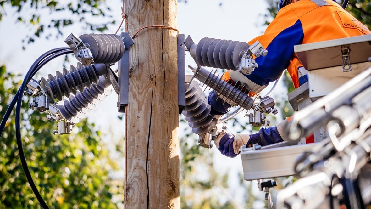 A surge arrester being installed.